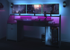 Gaming desk Gunman met paarse ledverlichting en 3 monitors in een tienerkamer