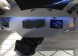 Bovenaanzicht van het bureau Gunman met blauwe ledverlichting