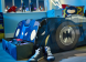 Detailfoto van het voorwiel van het kinderbed Batman met geopende lade